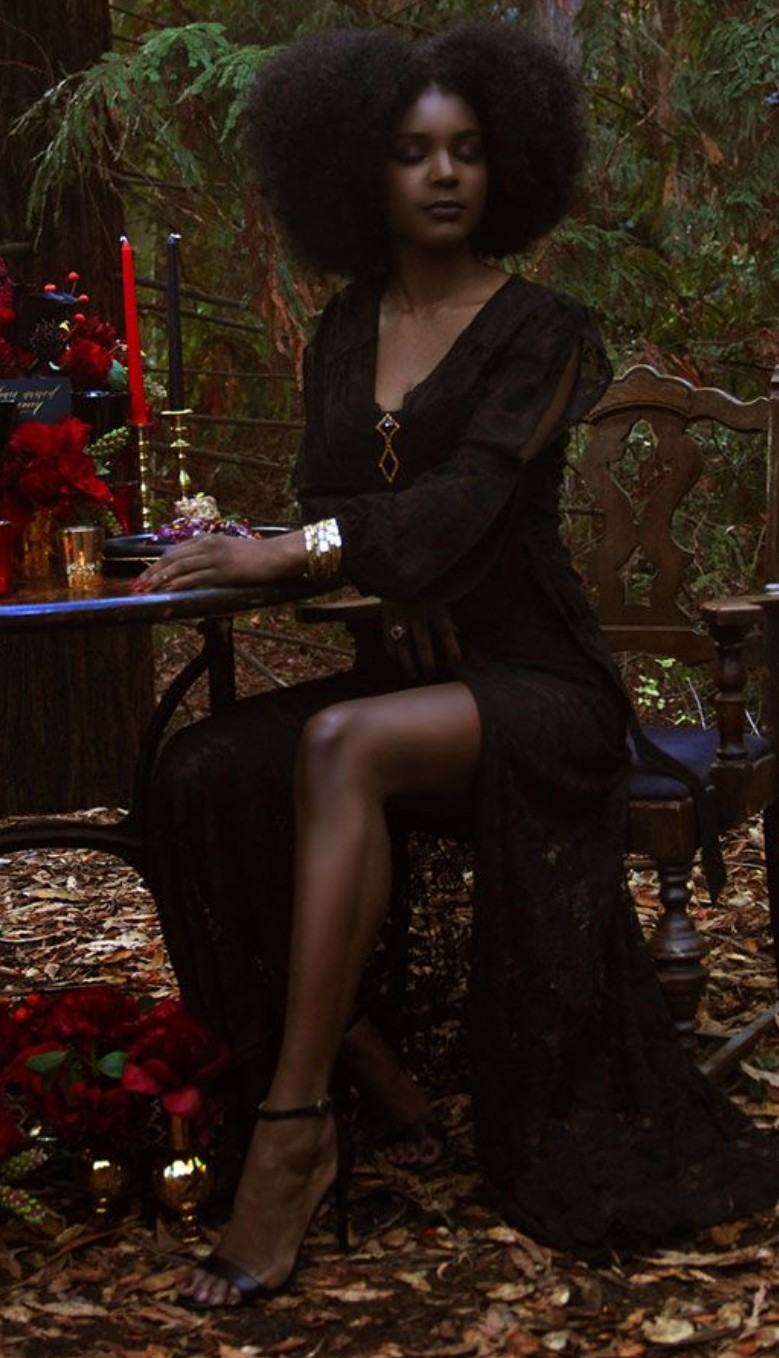 Black sheer witchy dress in a forest