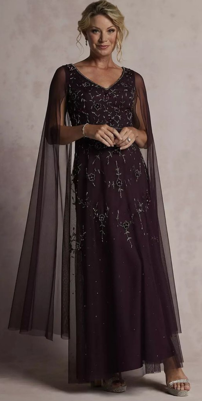Dark plum gown with sheer cape sleeves